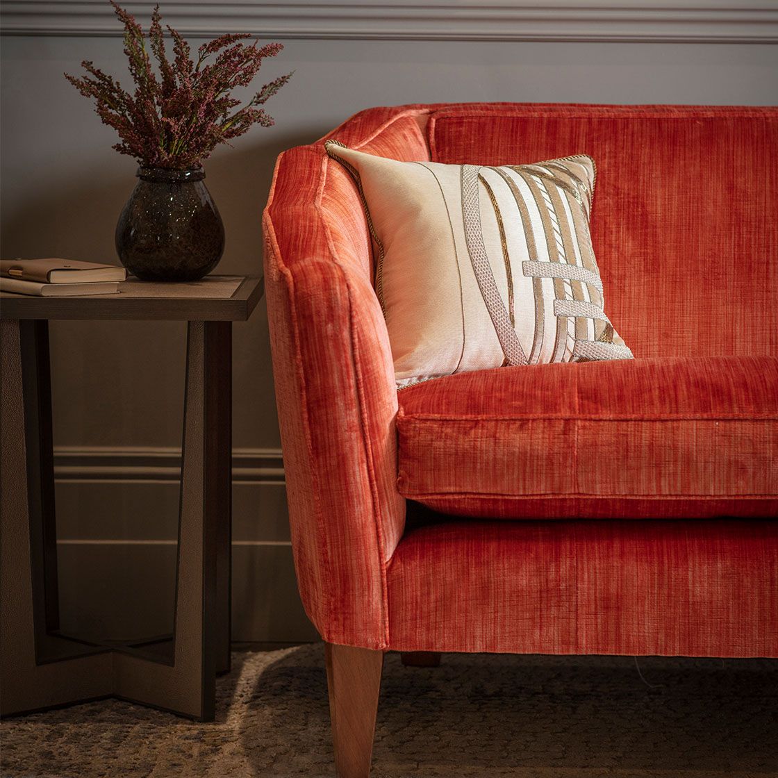 Josephine sofa in Como silk velvet - Pompeiian red detail with Audrey cushion - Beaumont & Fletcher