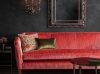 Josephine sofa in Como silk velvet - Pompeiian Red with Pisa wall light and Buckingham mirror with Habibi cushion - Beaumont & Fletcher