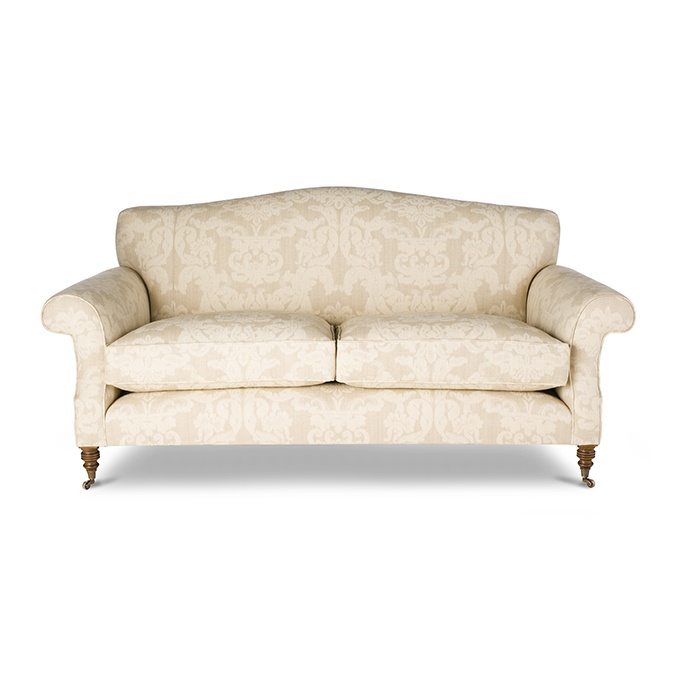 A bespoke, Georgian style sofa in a luxurious cream damask.