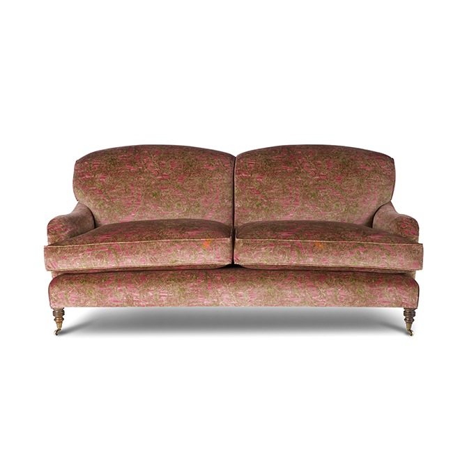 A luxurious deep seated sofa in classic printed velvet fabric.