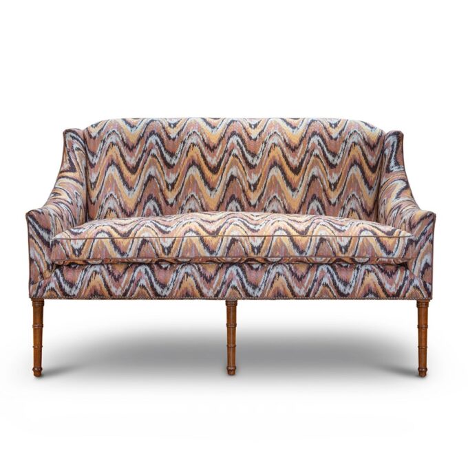 A luxurious, bespoke sofa in a modern flame stitch fabric.