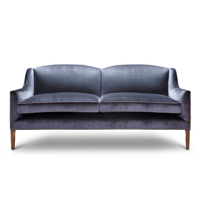 A handmade Art Deco style sofa upholstered in a luxurious blue silk velvet.