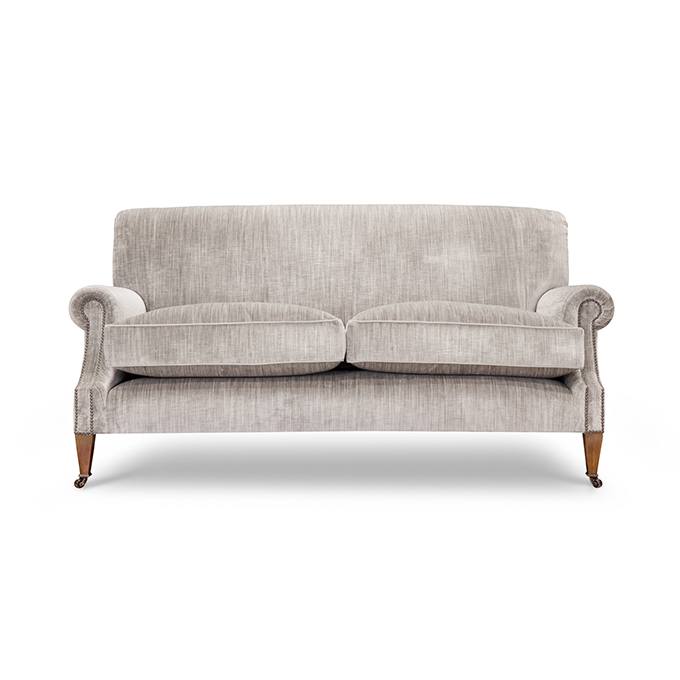 A luxury, bespoke sofa upholstered in a luxurious silk velvet.