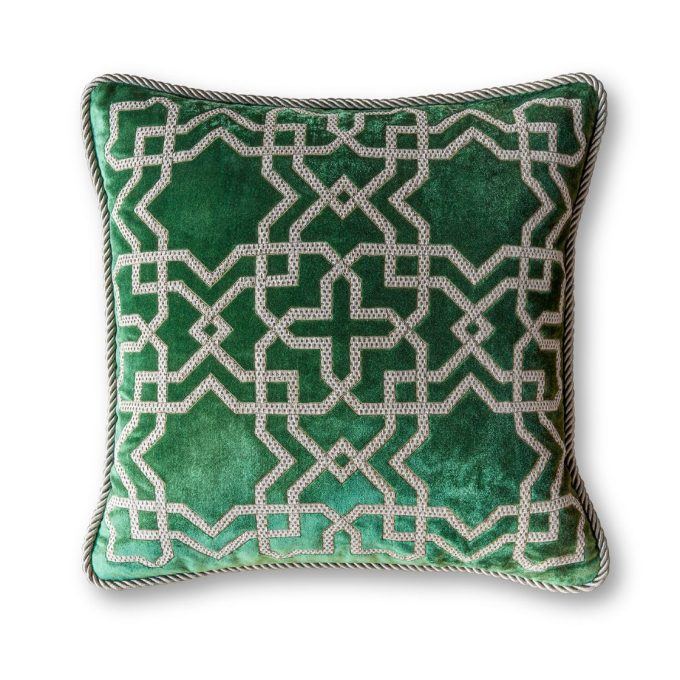 A hand embroidered designer cushion in green silk velvet