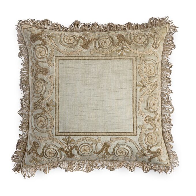 A hand embroidered designer cushion in silk velvet