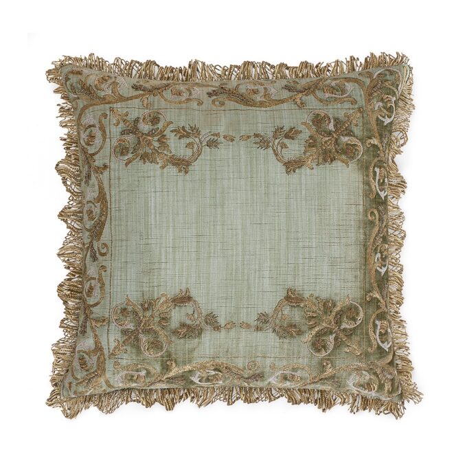 A hand embroidered designer cushion in silk velvet