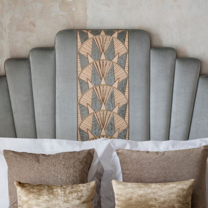 Miami headboard in Capri silk velvet - Glacier with Rockefeller embroidery, Chatsworth chandelier and Audrey embroidery on drapes