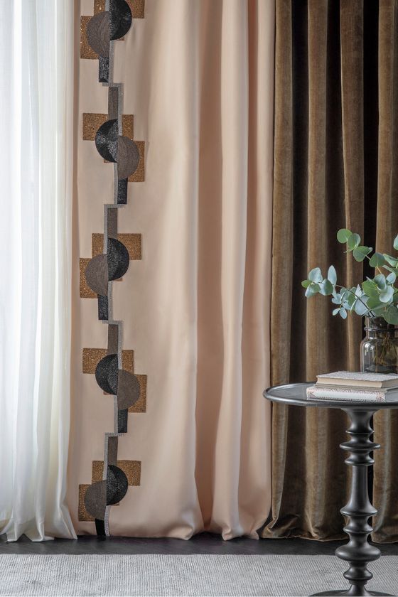 Contemporary drapes with a hand embroidered, Art Deco leading edge