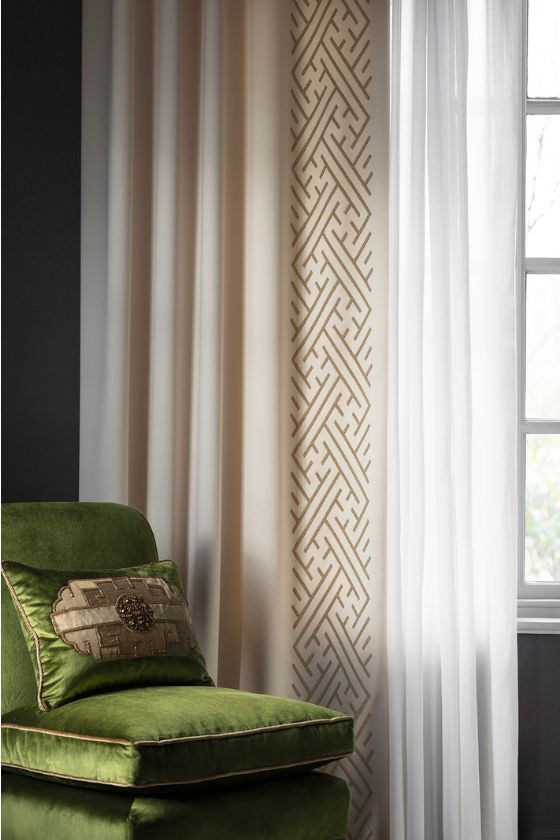 Luxurious drapes with a contemporary, hand embroidered leading edge