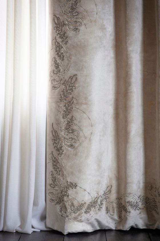 Sill velvet drapes with a botanical style, hand embroidered leading edge